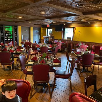 Fiore's Cafe - a kid sitting at a table - Italian Near Me - Ocala, Florida