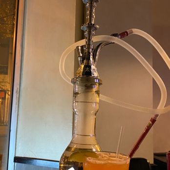 Anatolia Cafe & Hookah Lounge - a glass of orange juice and hookah - Turkish Near Me - Atlanta, Georgia Anatolia Cafe & Hookah Lounge - a glass of orange juice and hookah - Turkish Near Me - Atlanta, Georgia