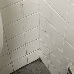 The wall and the corners was filthy The wall and the corners was filthy