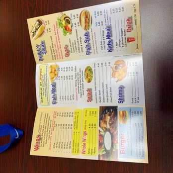 Wings and Seafood - a menu and a pair of scissors - Seafood Near Me - Rome, Georgia Wings and Seafood - a menu and a pair of scissors - Seafood Near Me - Rome, Georgia