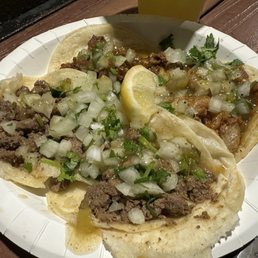Two asada, one al pastor, and one chicharron taco