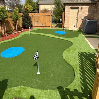 Southern Turf - Custom putting greens are fun for everyone! This blue turf adds a unique "water" feature to this customer's green! - Artificial Turf Near Me - Chamblee, Georgia