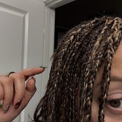 Blk Wax Bar - No tucking on my hair . This wasn't even my hair but the feed in braid.