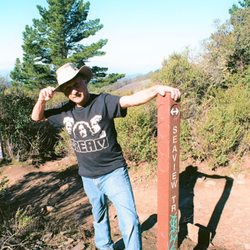 Seaview Trail - This is me wearing my CREAM T-shirt.  I'm on Seaview Trail. Behind me is trailhead for Arroyo Trail. - -Tom Brody