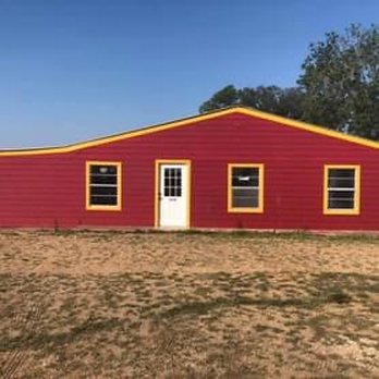 Gold Oak Leaf - a red building with yellow trim - Beer Gardens Near Me - Wharton, Texas