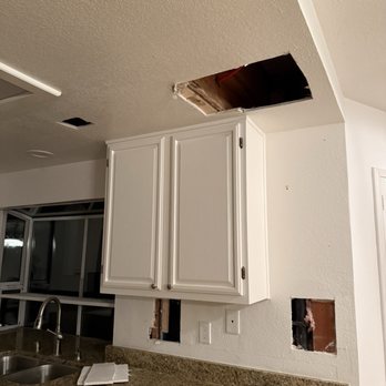 Aaron's Plumbing & Rooter - Kitchen counter wall before repair - Plumbing Near Me - Gilroy, California Aaron's Plumbing & Rooter - Kitchen counter wall before repair - Plumbing Near Me - Gilroy, California