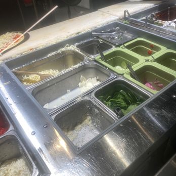 &pizza - The table with the ingredients.... not the best kept.... maybe cause the Bmore location was so clean I noticed.... - Vegan Near Me - Silver Spring, Maryland