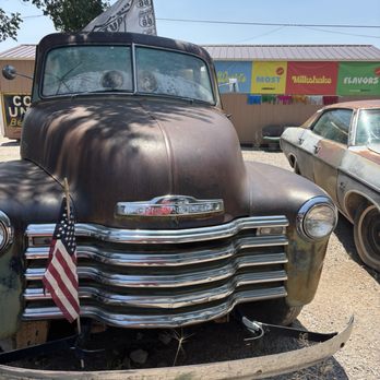 Delgadillo's Snow Cap Drive-In - A old cars themed Chevrolet out at the back of the restaurant - Burgers Near Me - Seligman, Arizona Delgadillo's Snow Cap Drive-In - A old cars themed Chevrolet out at the back of the restaurant - Burgers Near Me - Seligman, Arizona