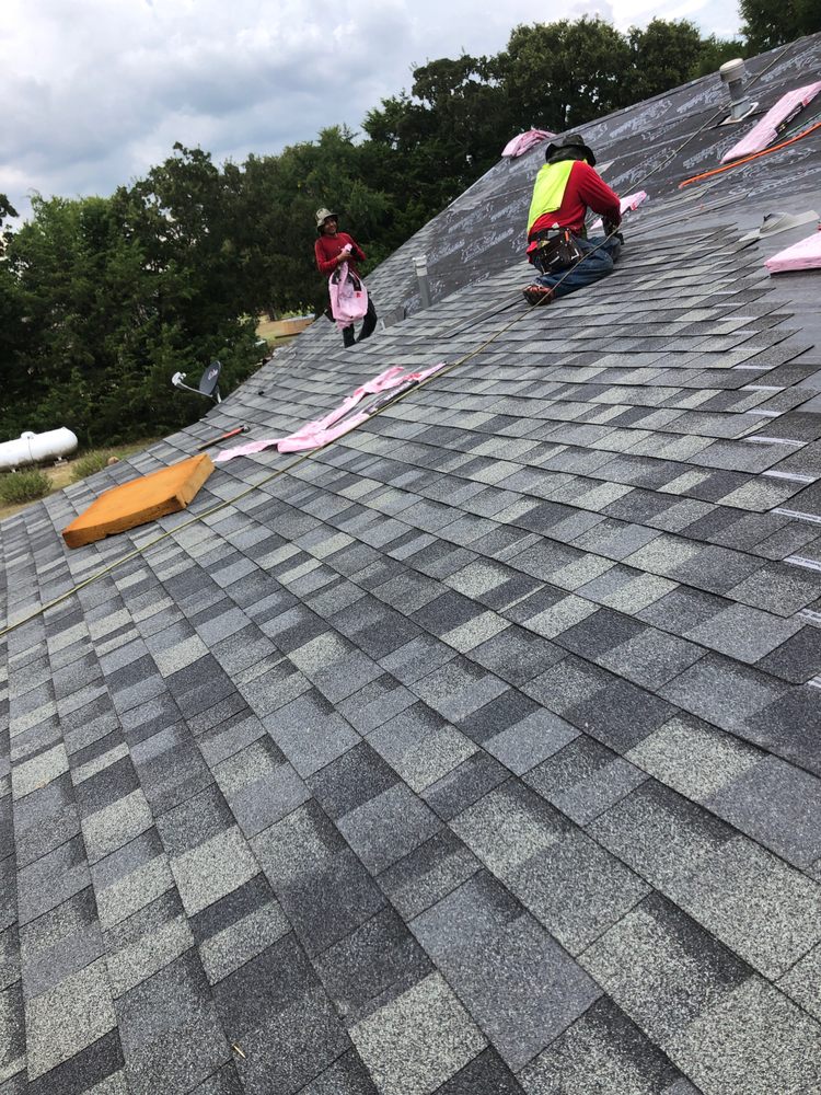 Slide of Tiger Roofing