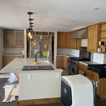 Condor Builders - Full view of remodeled kitchen. Note, a fireplace was removed where the fridge now sits - General Contractors Near Me - Grass Valley, California Condor Builders - Full view of remodeled kitchen. Note, a fireplace was removed where the fridge now sits - General Contractors Near Me - Grass Valley, California