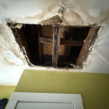 Gomez Brothers Remodeling - Hole caused by a leak in the roof. - Flooring Near Me