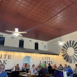 White Oak City Limits - Eating area- pretty small but sufficient. Very clean, local deck.
