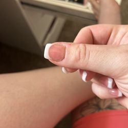 Lifted thumb nail on a 4 day old new set