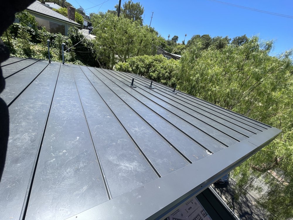 Slide of Dilligent Roofing