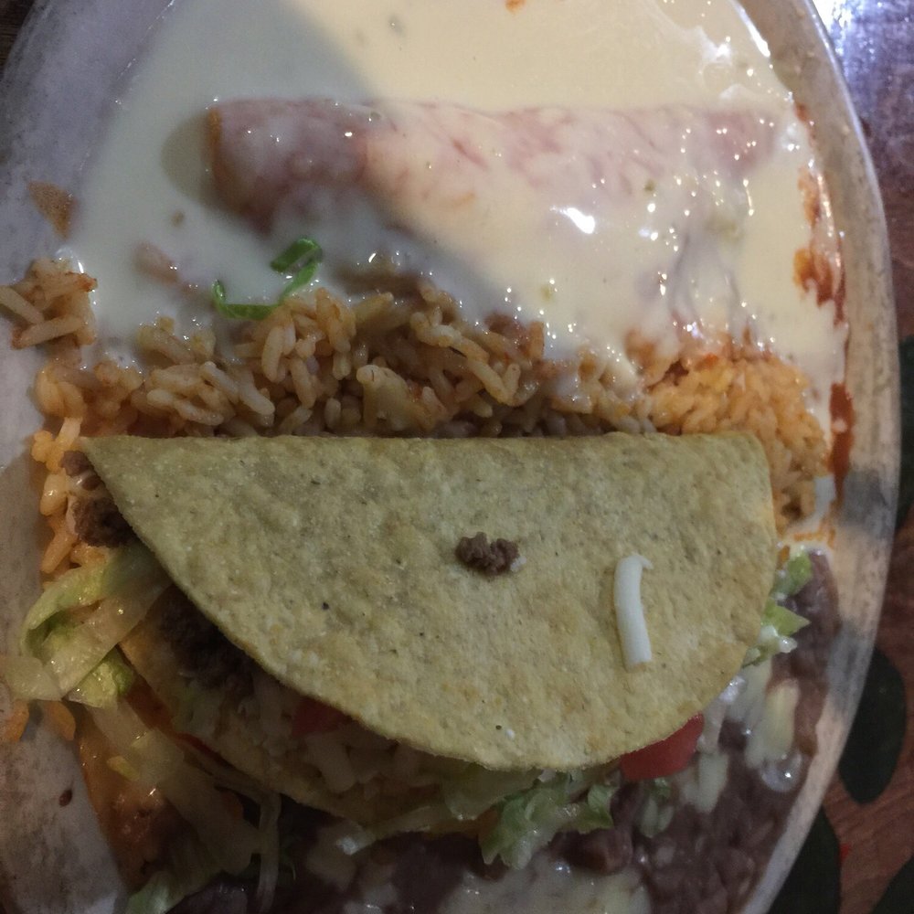 Mexican Flavors - Cheese enchilada with queso sauce. - Mexican Near Me - Belle Vernon, Pennsylvania Mexican Flavors - Cheese enchilada with queso sauce. - Mexican Near Me - Belle Vernon, Pennsylvania