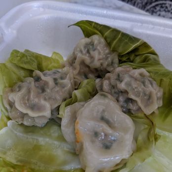 Olympic Noodle - Mandoo, Korean dumplings, on top of steamed cabbage. - Korean Near Me - Los Angeles, California Olympic Noodle - Mandoo, Korean dumplings, on top of steamed cabbage. - Korean Near Me - Los Angeles, California