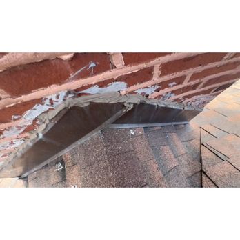 Cahill Building & Roofing - Where did they address the roof area around the chimney - Roofing Near Me - Chicago, Illinois