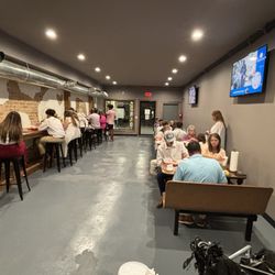 Wilson’s BBQ - Plenty of seating available! Outside stand bar in addition to indoor seating on our front patio.