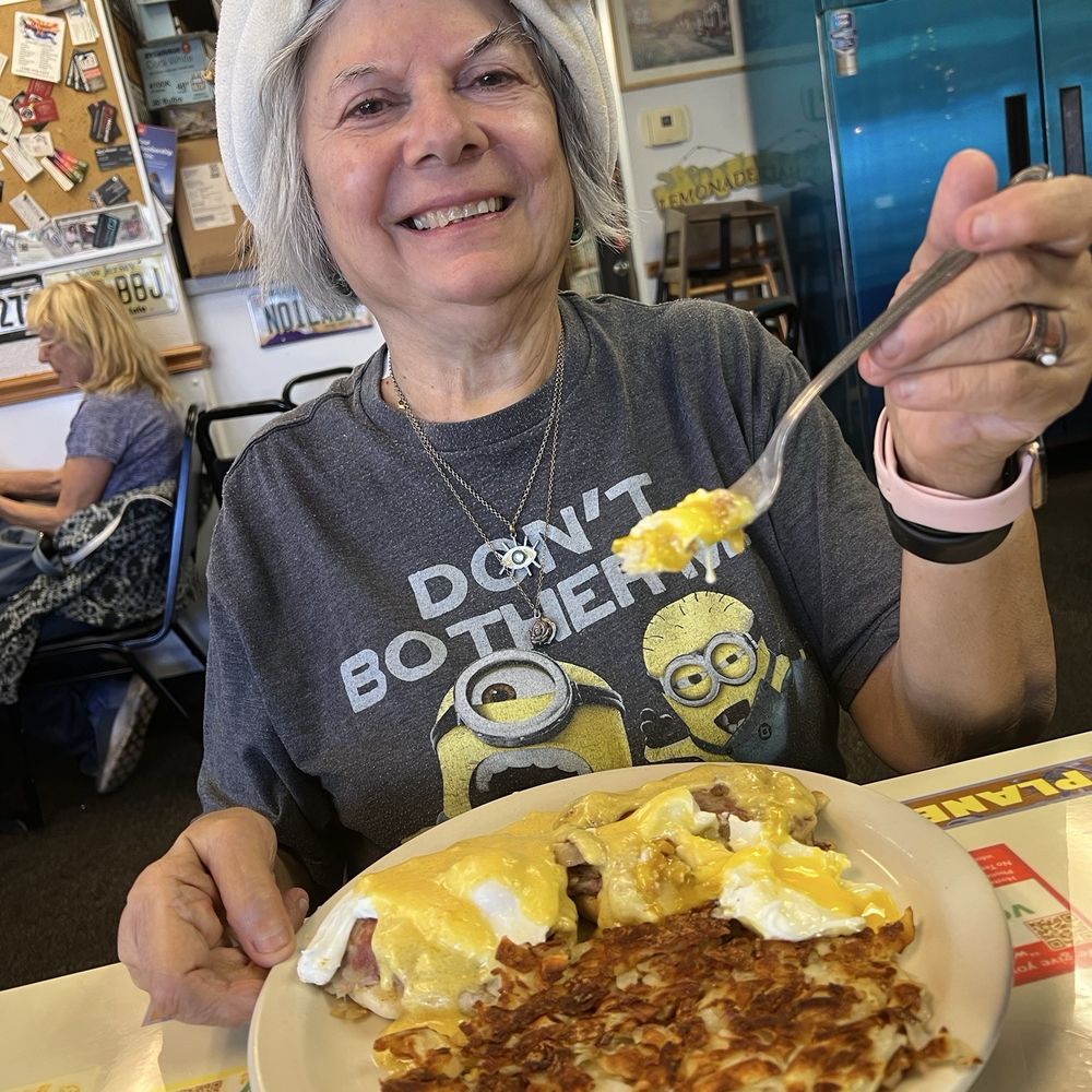 Otto's Empire Diner - Diana,enjoying poached eggs with corn beef - Diners Near Me - Phoenix, Arizona Otto's Empire Diner - Diana,enjoying poached eggs with corn beef - Diners Near Me - Phoenix, Arizona