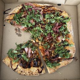 Prosciutto and fig pizza. The best I've had in a long time. Prosciutto and fig pizza. The best I've had in a long time.
