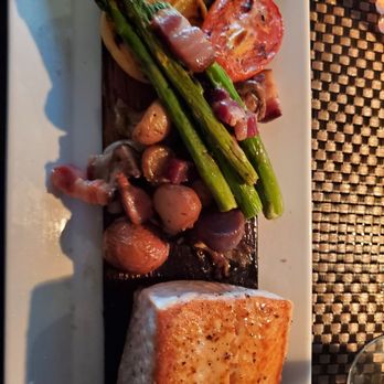 Six Seven Restaurant - Cedar plank salmon - New American Near Me - Seattle, Washington Six Seven Restaurant - Cedar plank salmon - New American Near Me - Seattle, Washington