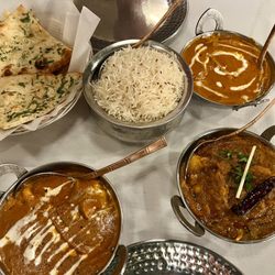 Everest Restaurant - Chicken tikka masala, alu gobi, butter chicken, and garlic naan