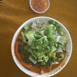 Butter chicken bowl. Rice letter cilantro and cucumber Butter chicken bowl. Rice letter cilantro and cucumber