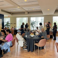 Durham Center For Senior Life - DCSL members enjoying National Coffee Day with the Durham Police Department.