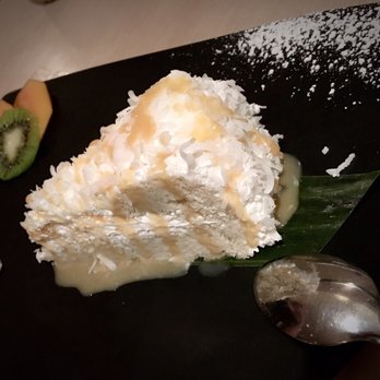 Cafe De Thai - The COCONUT CAKE had heavenly flavors and lovely textures, but it was extremely rich. It's best shared between a large group. - Thai Near Me - Reno, Nevada Cafe De Thai - The COCONUT CAKE had heavenly flavors and lovely textures, but it was extremely rich. It's best shared between a large group. - Thai Near Me - Reno, Nevada