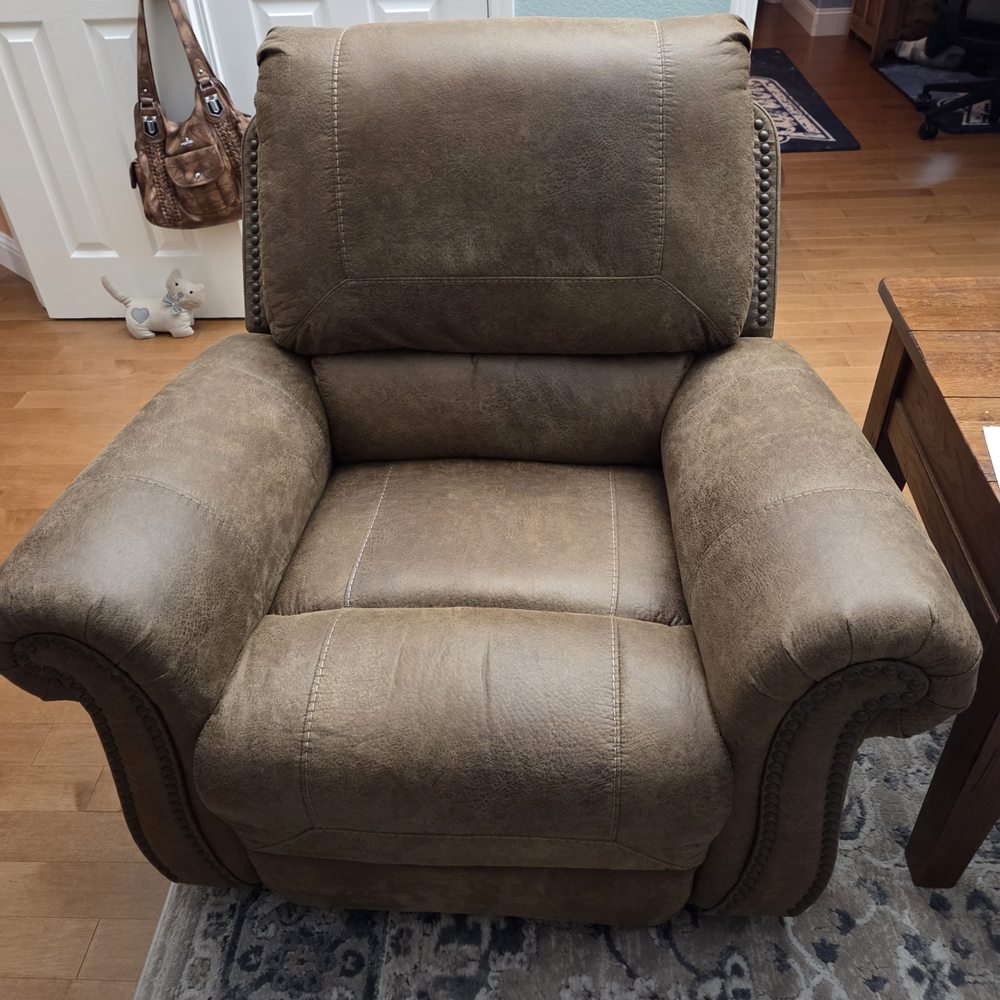 Beautiful chair that we can't sit in 700.00 down the drain!