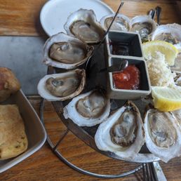 Focaccia and a dozen oysters at happy hour Focaccia and a dozen oysters at happy hour