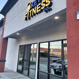 Exterior outside entrance of Key Fitness - We're located in a beautiful commercial building near the gorgeous Victoria Ave in Riverside. Yes, we have air conditioning! - Riverside, California Exterior outside entrance of Key Fitness - We're located in a beautiful commercial building near the gorgeous Victoria Ave in Riverside. Yes, we have air conditioning! - Riverside, California