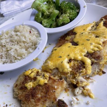 Island Grill - Coconut encrusted snapper with garlic broccoli & rice. - Seafood Near Me - Islamorada, Florida Island Grill - Coconut encrusted snapper with garlic broccoli & rice. - Seafood Near Me - Islamorada, Florida