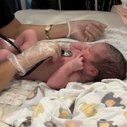 Natural Birth Works - Newborn exam. My son was so calm with them