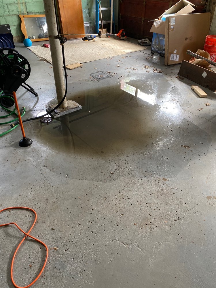 Slide of Down's Septic & Drain