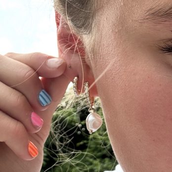 Tori Ear Piercing - Broken turquoise stud. - Piercing Near Me - Port Washington, New York Tori Ear Piercing - Broken turquoise stud. - Piercing Near Me - Port Washington, New York