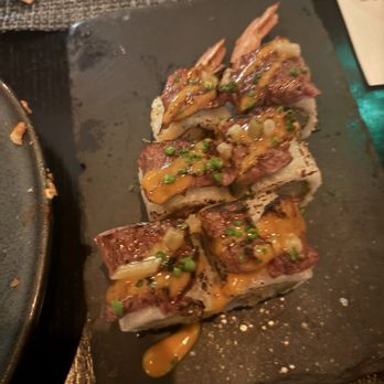 Mizu - Cowboy sushi roll had tempura shrimp inside and Wagyu beef on top. Delicious - Seafood Near Me - Charlotte, North Carolina Mizu - Cowboy sushi roll had tempura shrimp inside and Wagyu beef on top. Delicious - Seafood Near Me - Charlotte, North Carolina