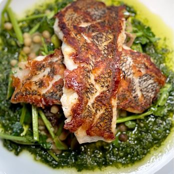 Chaplin - a plate of food with broccoli and fish - Seafood Near Me - Shelton, Connecticut