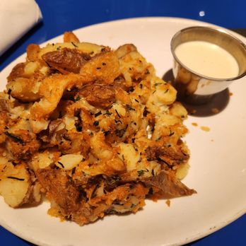 Blue Note Hawaii - Rosemary garlic truffled Parmesan potato wedges - Music Venues Near Me - Honolulu, Hawaii