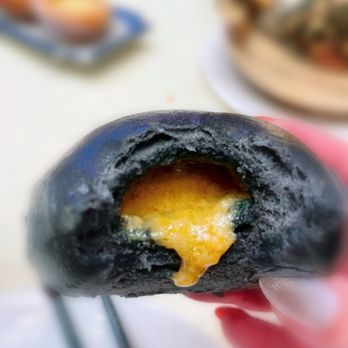 HL Peninsula Pearl - Inside of Salted Egg Yolk Lava Black Buns - Dim Sum Near Me - Burlingame, California HL Peninsula Pearl - Inside of Salted Egg Yolk Lava Black Buns - Dim Sum Near Me - Burlingame, California