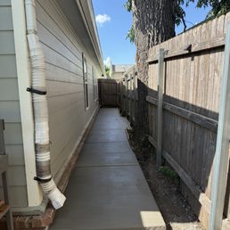 The new sidewalk on the side of my house. The new sidewalk on the side of my house.