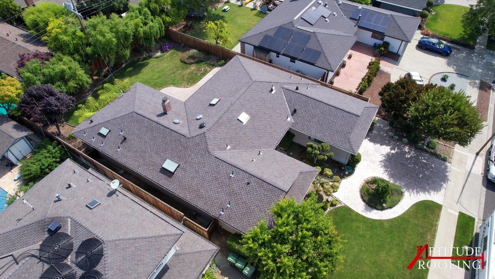 Slide of Aptitude Roofing