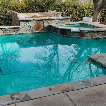 Frontier Pools - Pool with green plaster - Pool & Hot Tub Service Near Me