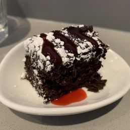 a piece of chocolate cake on a plate