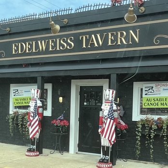 Edelweiss Tavern - Front entrance during canoe marathon 2026 - Bars Near Me - Oscoda, Michigan Edelweiss Tavern - Front entrance during canoe marathon 2026 - Bars Near Me - Oscoda, Michigan