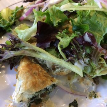 Kapnos Taverna - Spanakopita under a salad. - Greek Near Me - Arlington, Virginia Kapnos Taverna - Spanakopita under a salad. - Greek Near Me - Arlington, Virginia