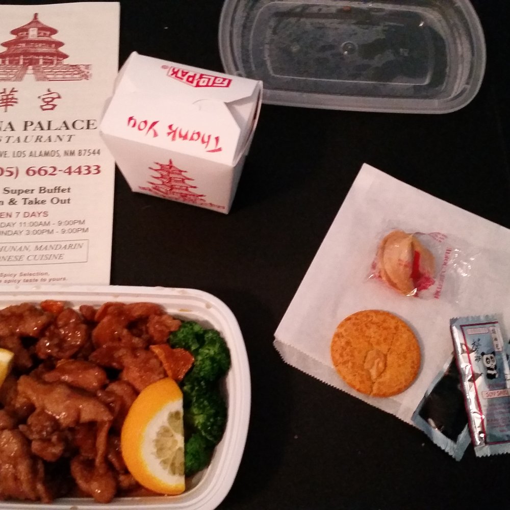 Orange chicken with white rice was packaged well in to-go bag Orange chicken with white rice was packaged well in to-go bag