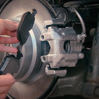 Axellion Auto Lab - Replacement of brake pads in progress, ensuring optimal braking performance and safety. - Wheel & Rim Repair Near Me - Burbank, California Axellion Auto Lab - Replacement of brake pads in progress, ensuring optimal braking performance and safety. - Wheel & Rim Repair Near Me - Burbank, California
