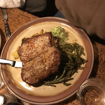 Schnitzelbank - Perfectly cooked medium rare steak with herb butter, potatoes, and pickled beans, delicious! - Wine Bars Near Me - Heidelberg, BW Schnitzelbank - Perfectly cooked medium rare steak with herb butter, potatoes, and pickled beans, delicious! - Wine Bars Near Me - Heidelberg, BW