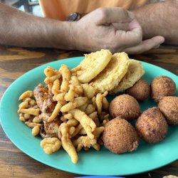 Family Coastal Restaurant - Clam strips,fried green tomatoes, grouper,hush puppies.